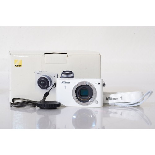 Nikon 2 mp - 1, j3