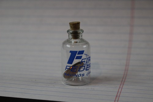 Penny bottle first - penny, in