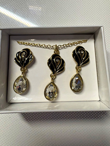 Gold tone black swirl crystal - gold,