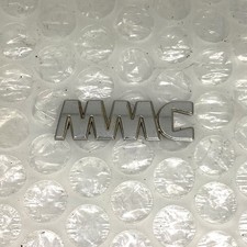 Mmc badge see - badge, description