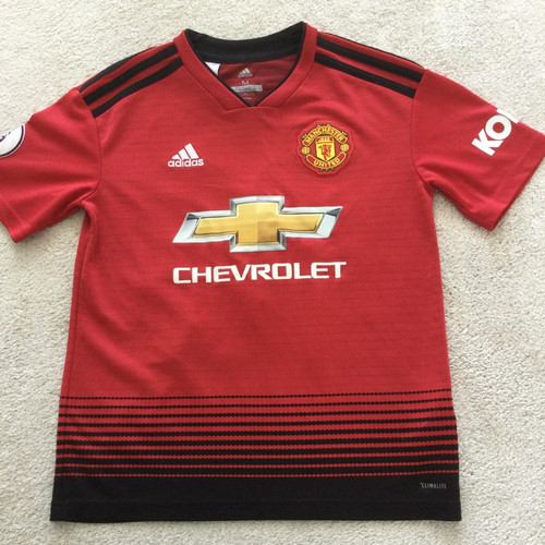 Man united home kit age - man,