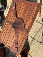 Butet stud girth brown leather