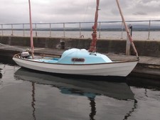 Drascombe Coaster trailer sailer with mariner out board and trailer