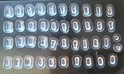 Mini newsprint alphabet and - alphabet,
