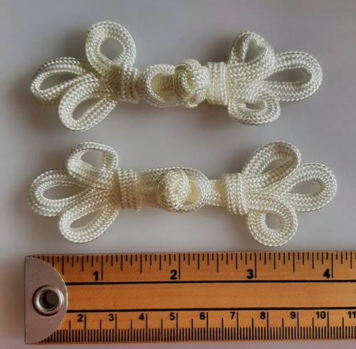 Large frog fasteners - x,