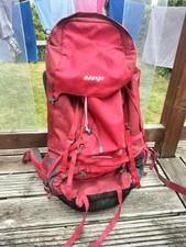 Red vango contour backpack 60+10 L. With raincover 