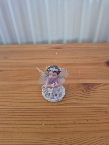 Small fairy figurine with - figurine,