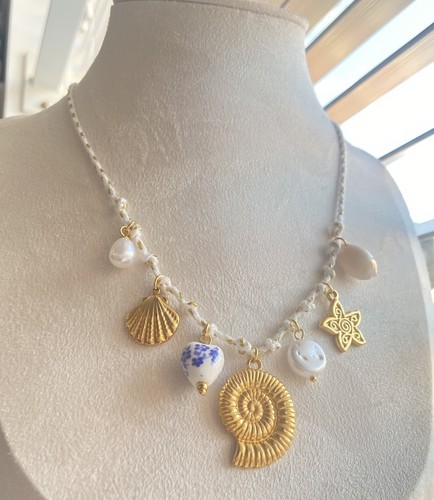 Gold tone shell - tone, mermaid
