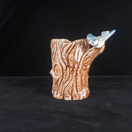 Wade blue bird tree trunk - bird,