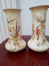 Crown Ducal blush ivory/apricot pair of vases. Bird design. 23.5cm high
