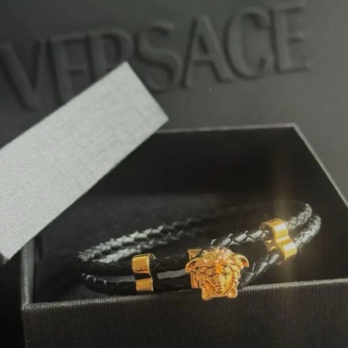 Used versace bracelet gold - versace,