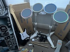 Wii Rockband Complete Set. Drums, Guitar Microphone, Leads, Dongles & Game.