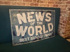 Old 'news of the World' enamel
