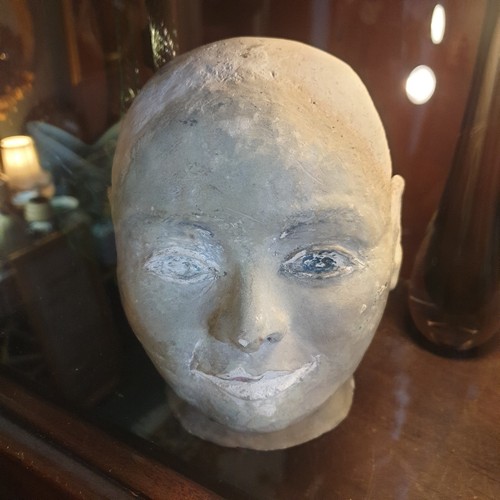 Original stone head sculpture