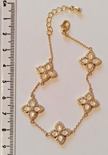 Yellow metal shamrock bracelet