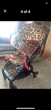 cosatto pram here me roar paloma faith leopard print
