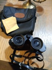 Binoculars See Photos