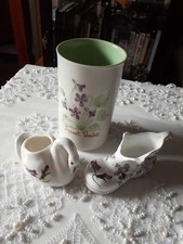 THREE CHINA ORNAMENTS WITH VIOLETS, ONE HAND PAINTED BRANKSOME VASE  (ENGLAND)