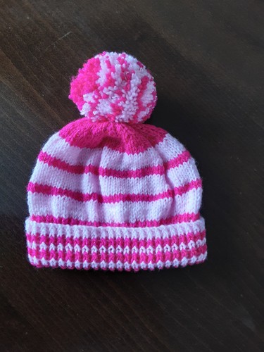 Hand knitted child - hand, pink