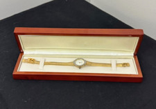 OLEG CASSINI DIAMOND ENCRUSTED QUARTZ DRESS WATCH IN BOX