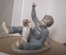 Nao by Lladro Figurine - Boy With Dog Playing # 278