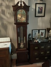 Grandmother clock. 6' 3.5" tall. Slim waist. Chimes. Mechanical. Replica