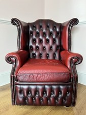 Traditionally Made Leather Chesterfield Wing Chair In Oxblood Red.