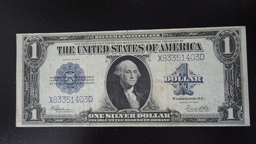 One silver certificate - $1,