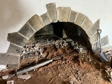 Reclaimed stone fireplace archway