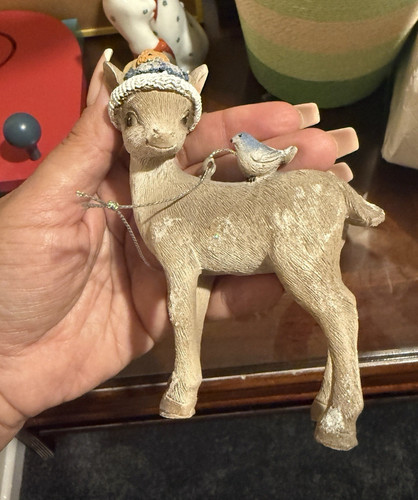 Deer figurine with blue bird - with,