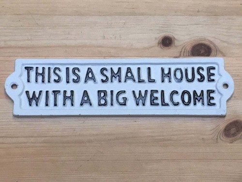 Cast iron sign this a - iron,