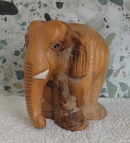 Hand carved wooden - hand, elephant