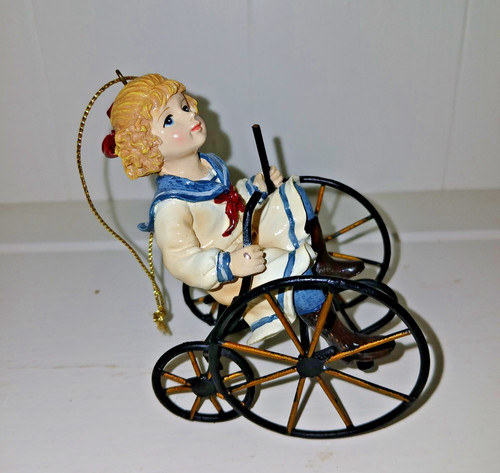 Girl bike hanging - on,