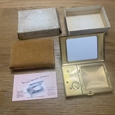 Vintage 'Melissa' musical compact, With  original powder pad Inc Powder
