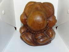 large wooden carved weeping