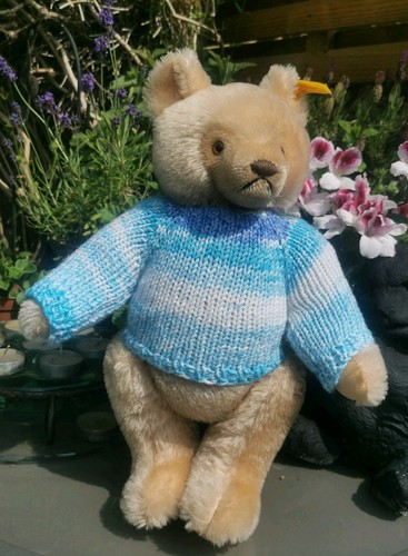 Hand knitted teddy bear