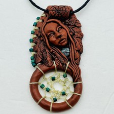 Carved Figural Face Pendant