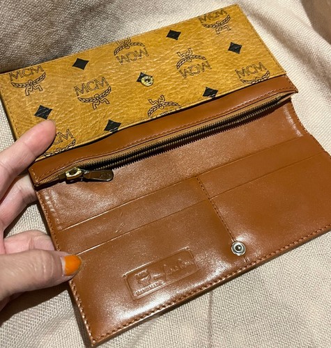 100 genuine mcm cognac - genuine,