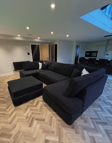 Large black plush corner sofa - black,
