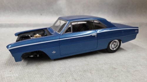 Blue chevrolet nova - model, car