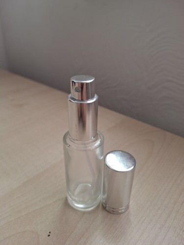Empty glass perfume bottle - empty,