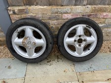 FORD FIESTA MK4 4 SPOKE ALLOY WHEELS + TYRES WILL NEED REPLACING 185 55 14 BYER 