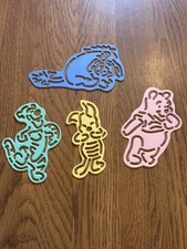 Winnie the Pooh stencils of Winnie the Pooh, piglet, Eeyore and tigger.