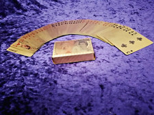 GOLD FINISH PLAYING CARDS BOXED.  8CM X 6CM X 2CM. * VERY GOLD TO THE NAKED EYE.