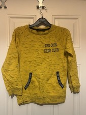 George Boys mustard yellow, black specks jumper, size 5-6yrs In good condition.
