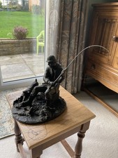 Bronzed Sculpture. Fisherman and Dog.  Heredities