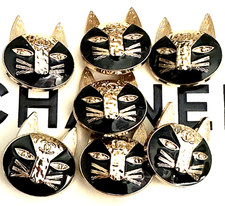 SET OF 7 CHANEL BUTTONS 