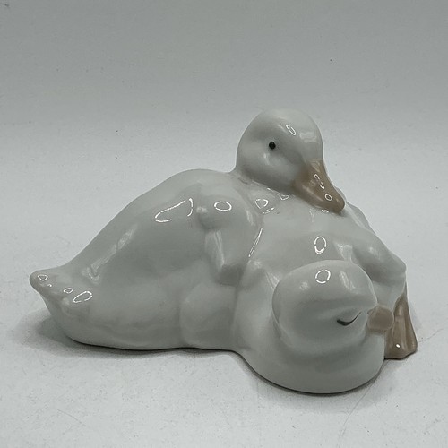 Nao lladro pair - by,