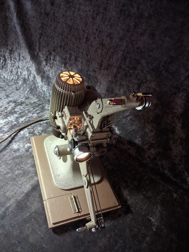 Vintage bell howell model - &,