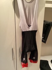 Castelli , Size Large, Black. Good condition.  Bib shorts and top 